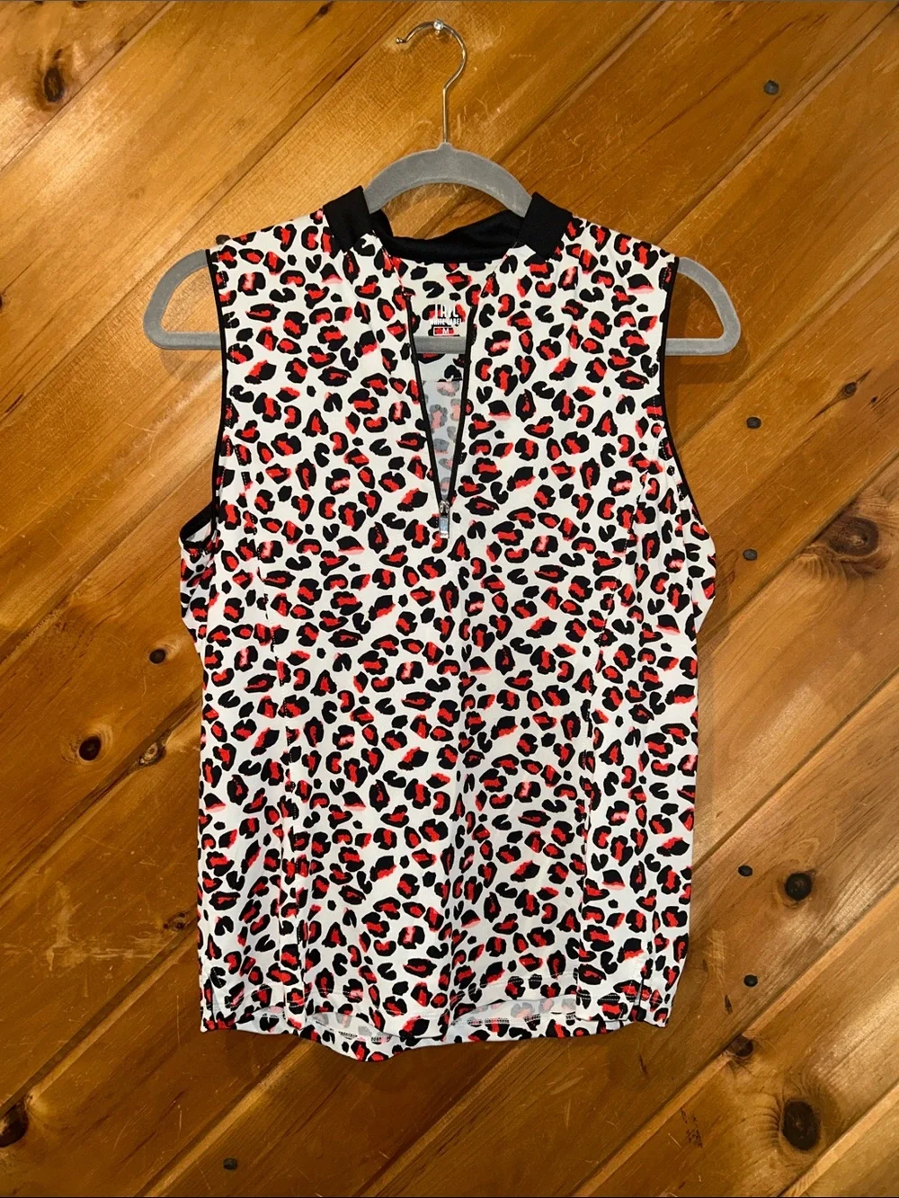 Tail White Label red & black leopard sleeveless golf top